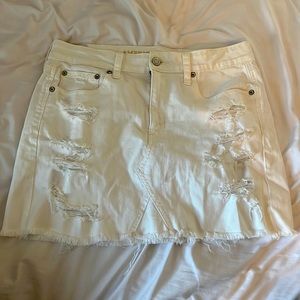American eagle ripped white jean skirt